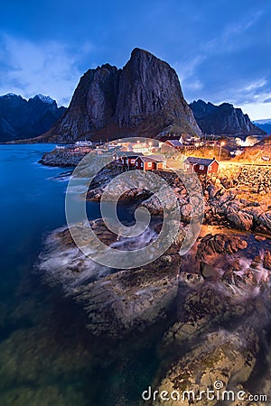 Fishermenâ€™s cabins in the Hamnoy village at night, Lofoten Isl Stock Photo